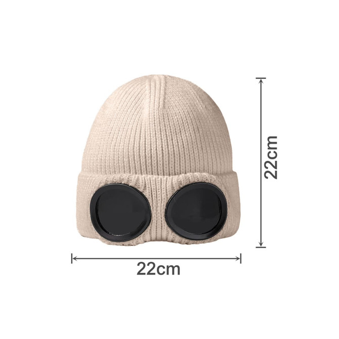 A beige beanie featuring large black goggles attached, measuring 22cm in height and diameter.