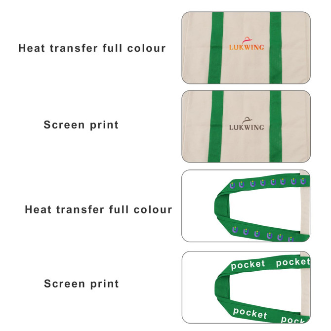 A canvas tote bag featuring green handles, with various printed designs on its surface and a pocket detail.