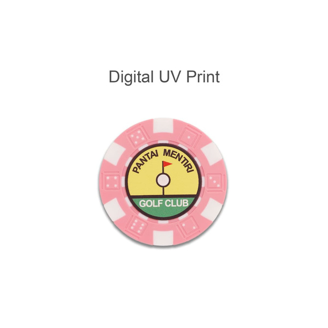 A pink poker chip featuring a yellow centre with a golf flag graphic and a logo. It has a decorative edge design.