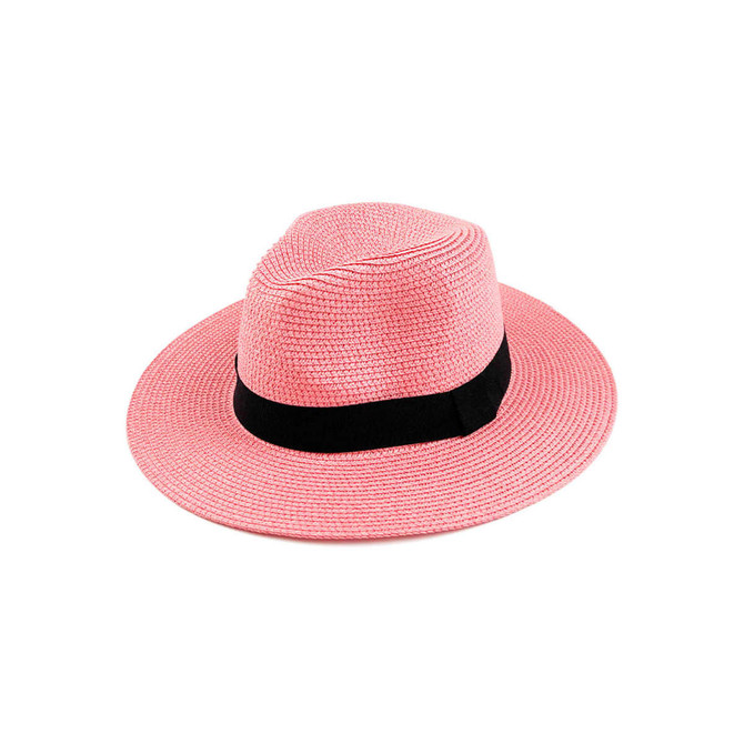 A pink sun hat with a black band, featuring a wide brim and a textured weave design.