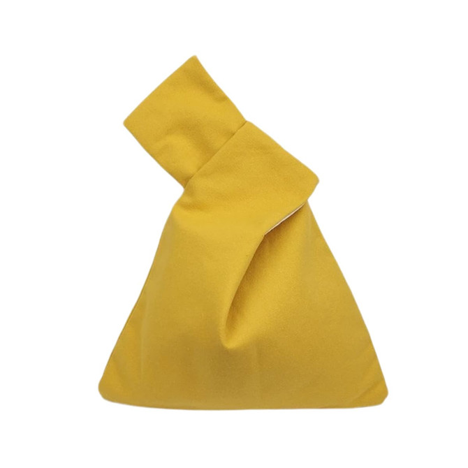 A cotton wrist bag in a vibrant yellow colour with a unique folded design and a logo.