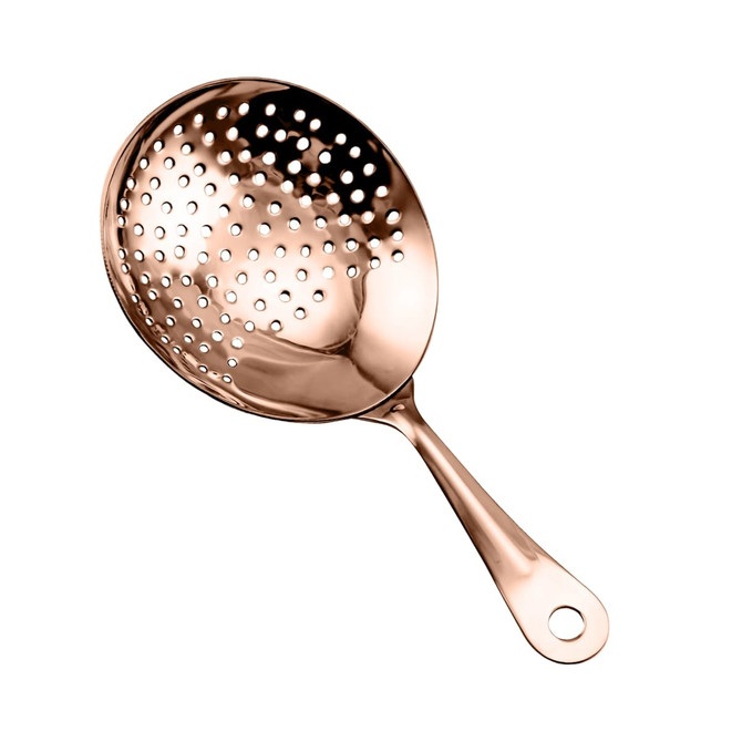 A cocktail strainer in a shiny rose gold colour with a long handle and multiple perforations. It features a logo.