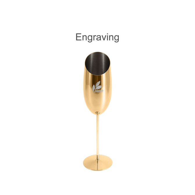 A stainless steel slanted champagne flute in gold, featuring a simple design and a logo on the surface.