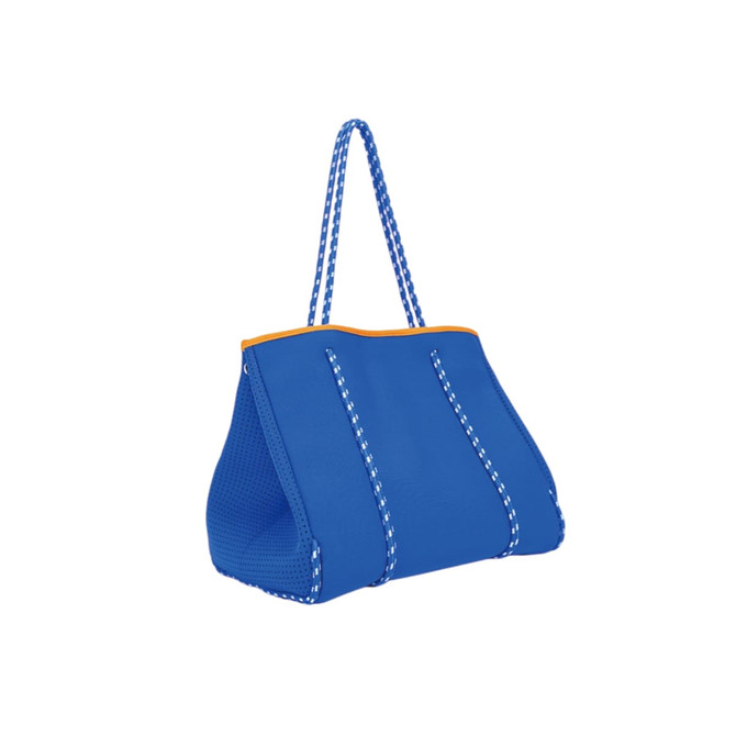 A large blue neoprene beach tote bag with patterned rope handles and orange trim. It features a logo.