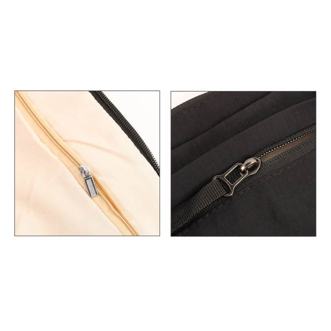 A close-up of two zippers on a lightweight crossbody bag, featuring a beige interior and a black exterior.