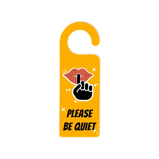 A custom shape acrylic door hanger in bright yellow with a design featuring a shushing hand and lips.