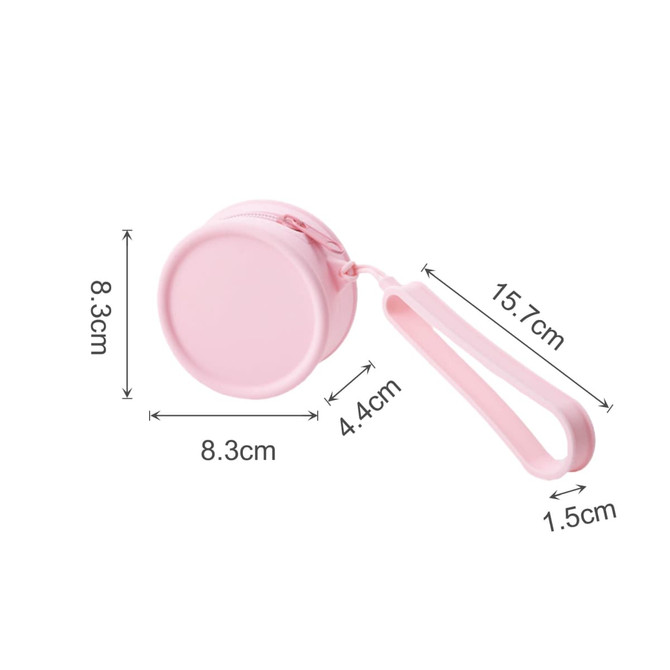 A round pink silicone coin pouch with a zipper, featuring a wrist strap and clear measurements.