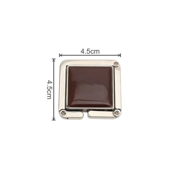 A square foldable desk hook in shiny silver with a dark brown square panel, measuring 4.5cm on each side.