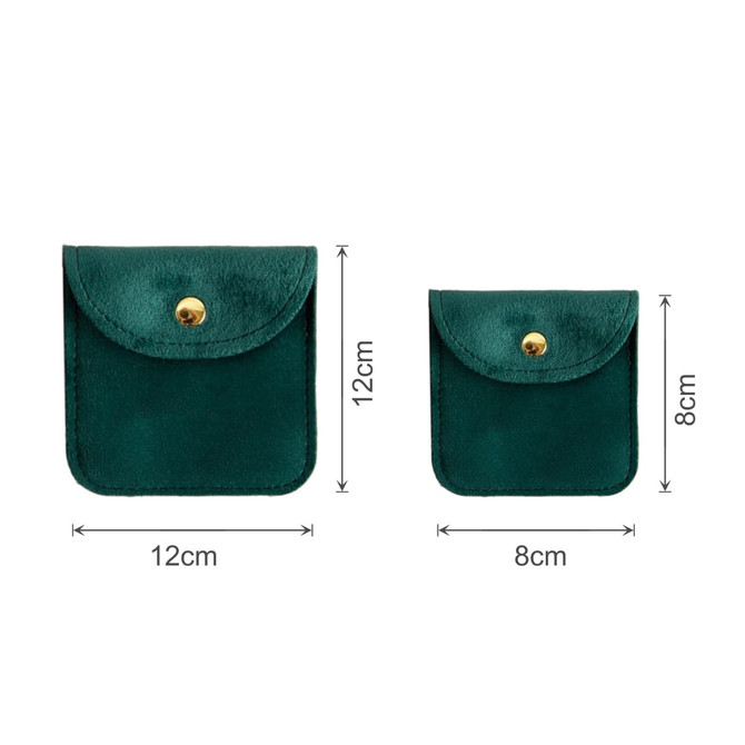 A square velvet jewelry pouch in a deep green colour, featuring a snap button closure, available in two sizes.