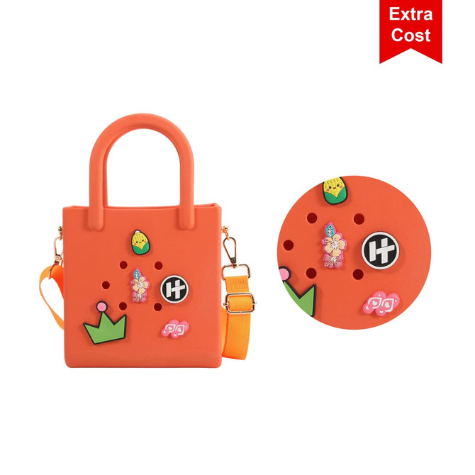 An orange mini beach bag with decorative embellishments and a logo, featuring carry handles and a shoulder strap.