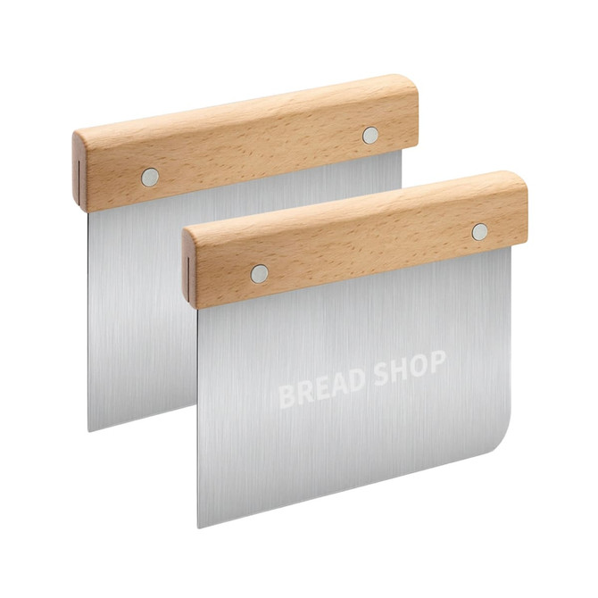 A set of two flour cutters featuring beechwood handles and stainless steel blades. The handles are light wood in colour.