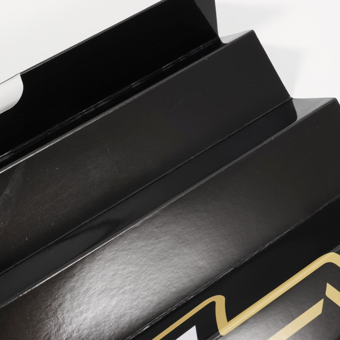 A black Clap Banner with a glossy finish, featuring sections that fold outward. It includes a logo.