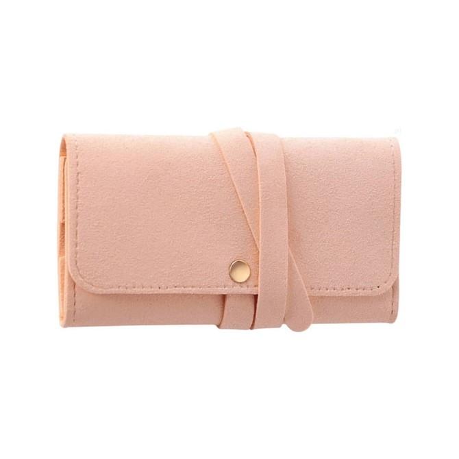 A pink synthetic leather jewellery bag, featuring a flap closure and a strap for secure fastening.