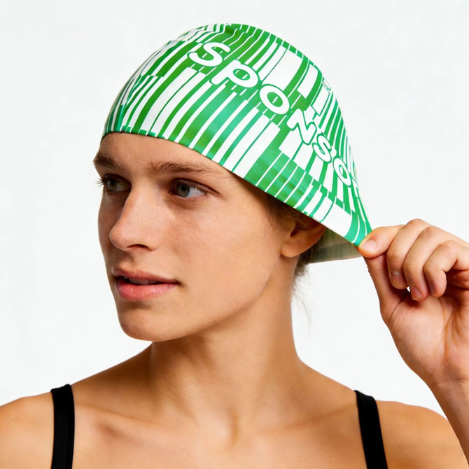 A green and white silicone swim cap designed for women with long hair, featuring a logo.