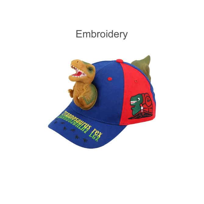 A blue and red cap featuring a dinosaur figure on top and embroidered designs on the front.