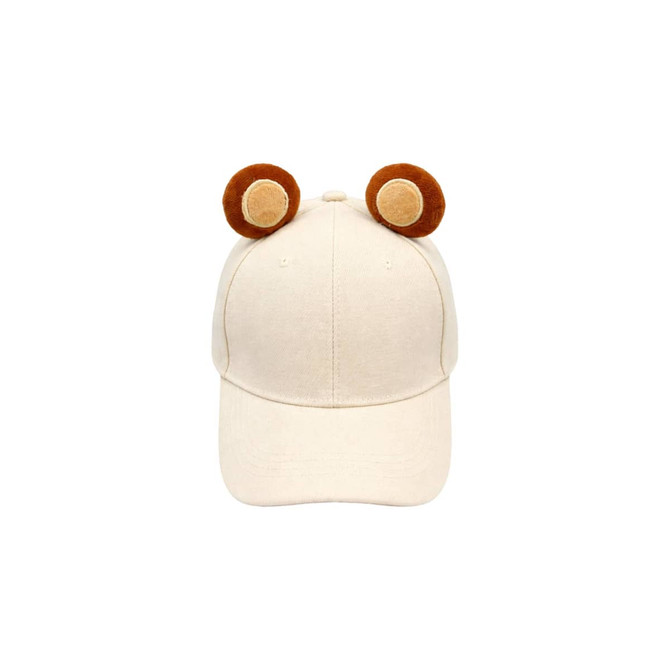 A cream-coloured baseball hat featuring cute brown animal ears on top. It has a logo on the side.