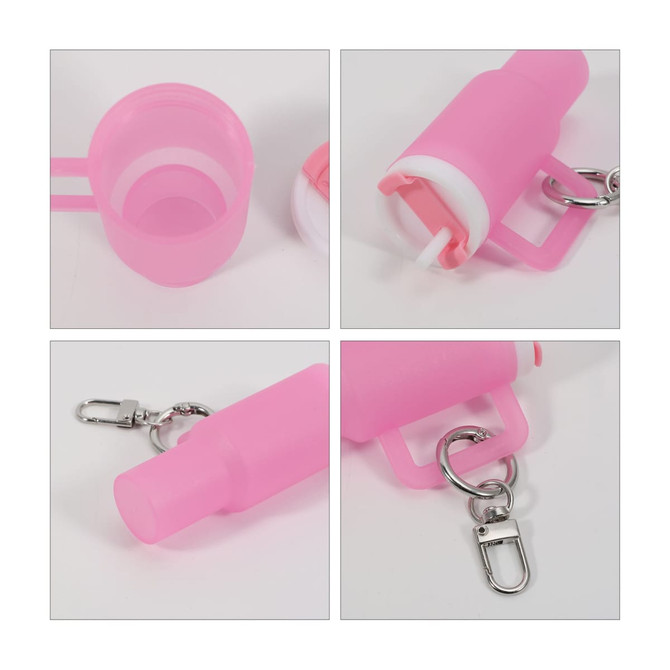 A pink glow-in-the-dark mini tumbler keyring with a metal clip and removable lid for easy access.