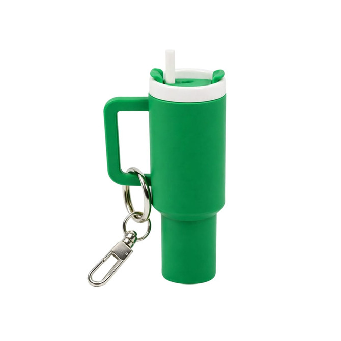 A green mini tumbler keyring with a straw and a keychain attachment, featuring a handle and a white lid.