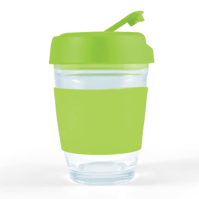 A reusable coffee cup with a transparent body and a bright green lid and sleeve. It has a logo present.