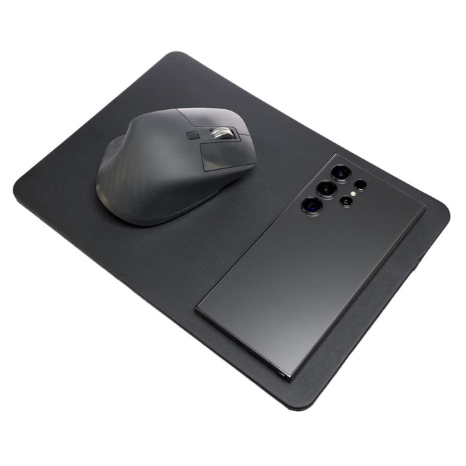 A sleek black mouse pad with an integrated wireless charger, featuring a smartphone and a computer mouse on top.