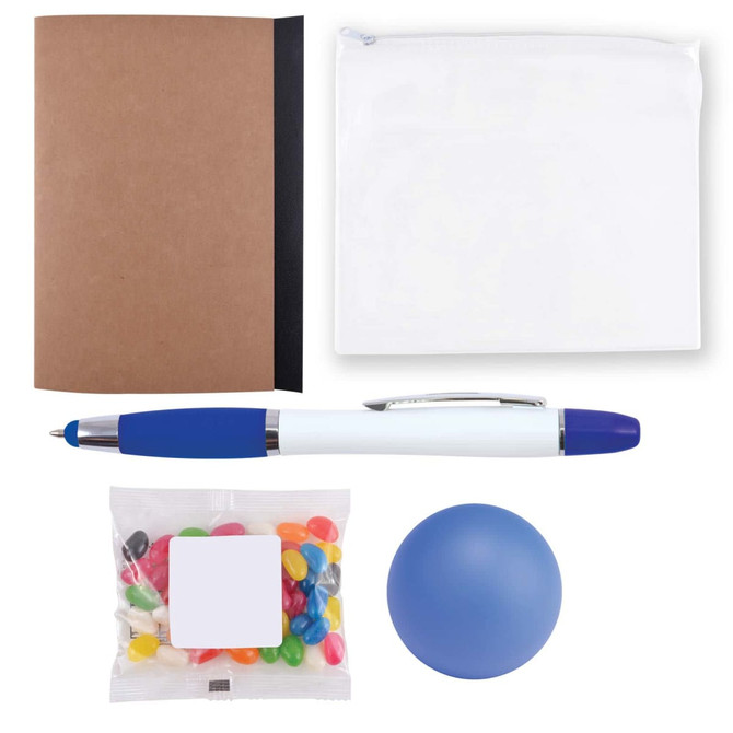 A notebook with a brown cover, a white zip pouch, a blue pen, a bag of colorful jelly beans, and a blue stress ball.