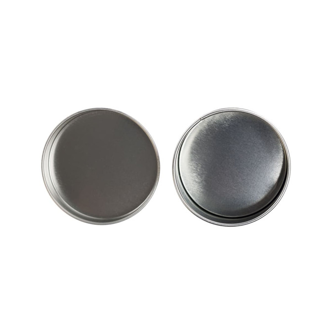 Two silver round tins with smooth metallic surfaces, featuring a polished finish.
