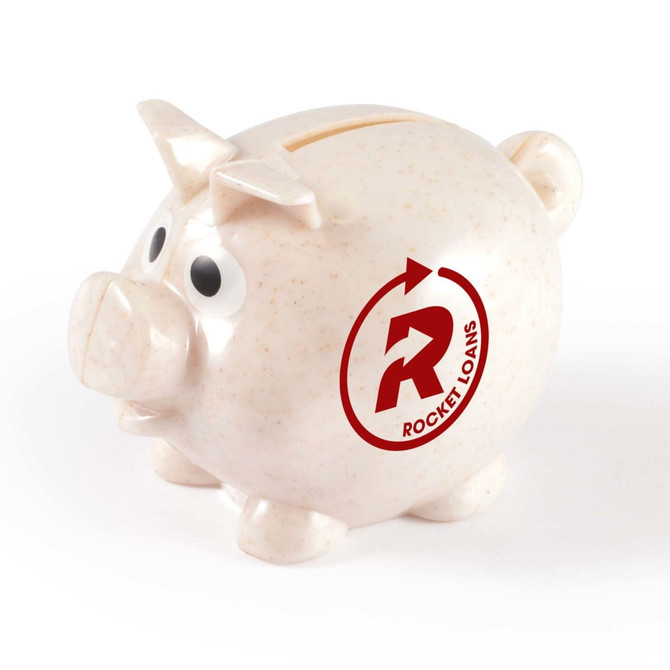 A small speckled pink piggy bank with a logo, featuring large eyes and a coin slot on top.