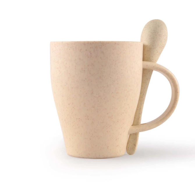 A reusable cup in light beige with a matching spoon, featuring a handle and a textured finish.