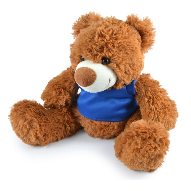 A plush teddy bear in a brown color with a blue shirt, featuring soft fur and a friendly face.