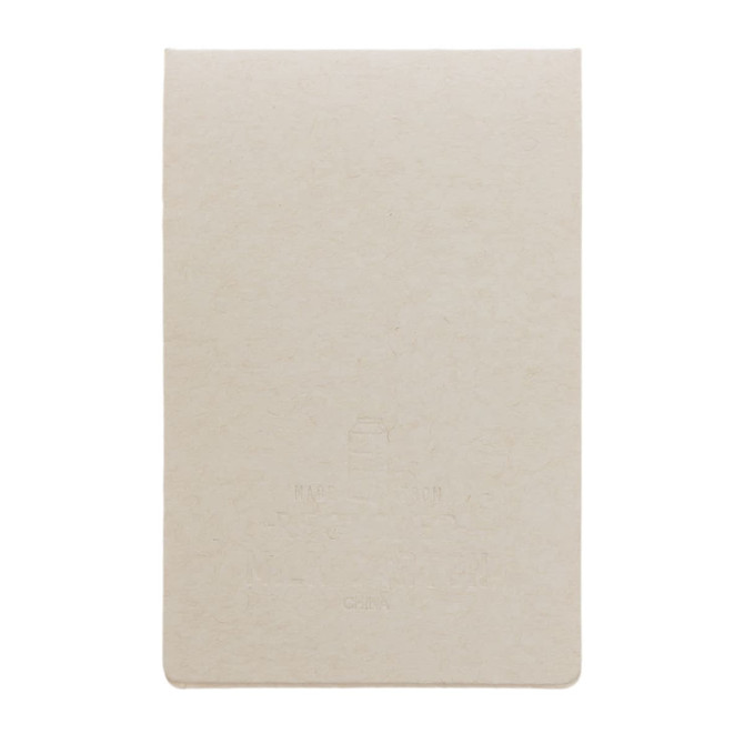 A beige sticky note pad with a textured surface, featuring a subtle embossed design. It has a neutral color scheme.