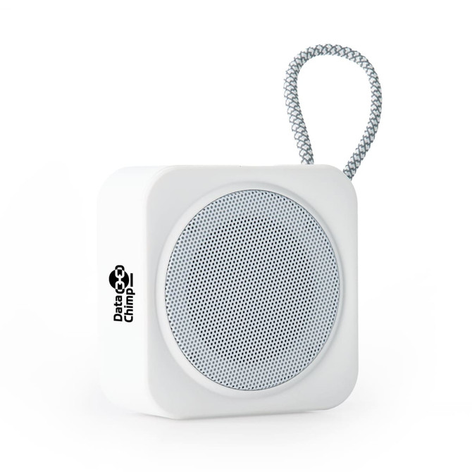 A compact white speaker with a circular grille and a grey loop for hanging, featuring a logo on one side.
