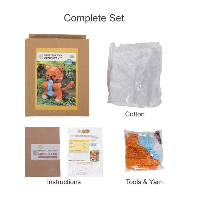 A crochet kit in a cardboard box featuring orange yarn, cotton, tools, and instructions for making toys.