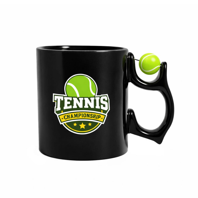 A black ceramic mug features a green tennis ball at the handle and a printed tennis championship logo.