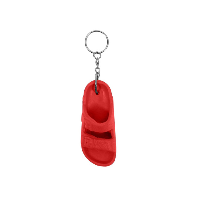 A red sandal-shaped keyring with a metal chain attachment, featuring realistic details. The keyring has a logo.