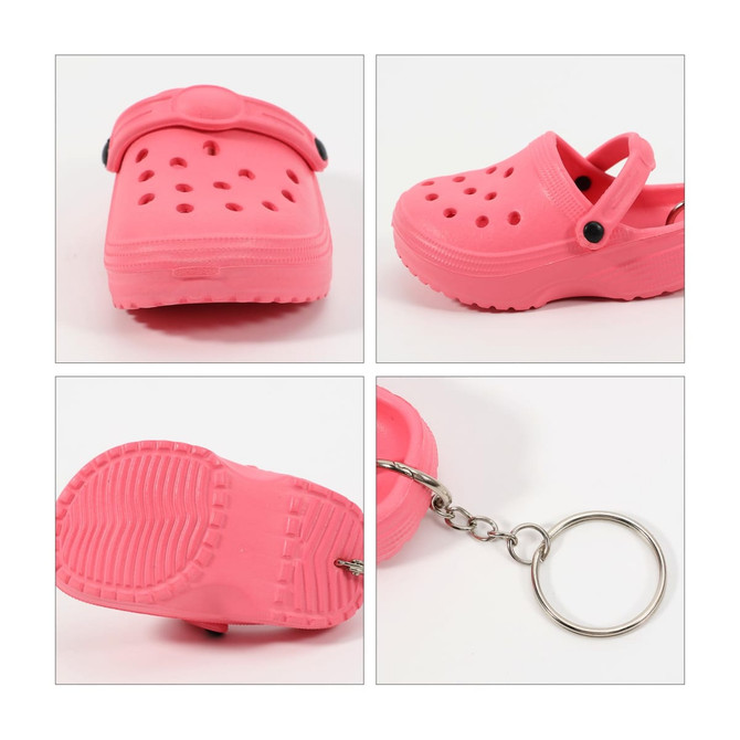 A pink classic clog shoe keyring with ventilation holes and a keychain loop, featuring a textured sole.
