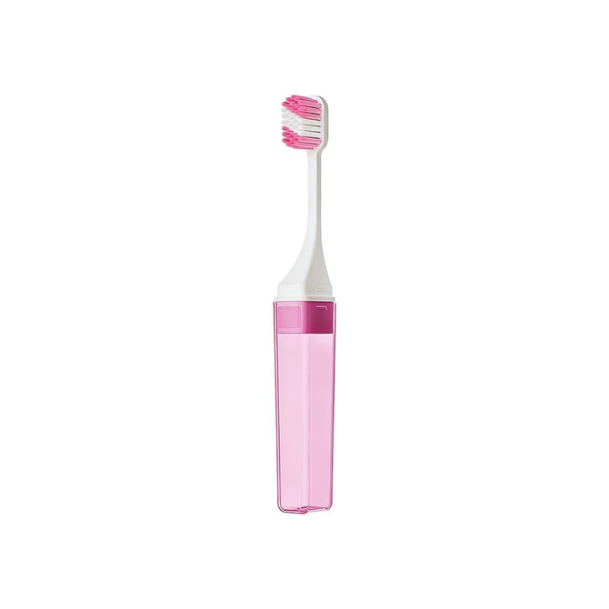 A square foldable handle toothbrush in white and pink, contained within a matching translucent pink case.