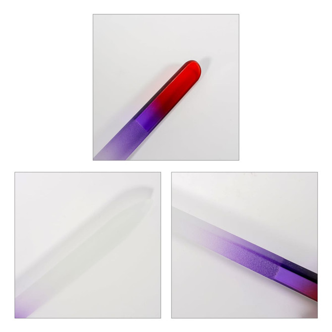 A gradient coloured glass nail file featuring a blend of red and purple hues, with a smooth, sleek design.
