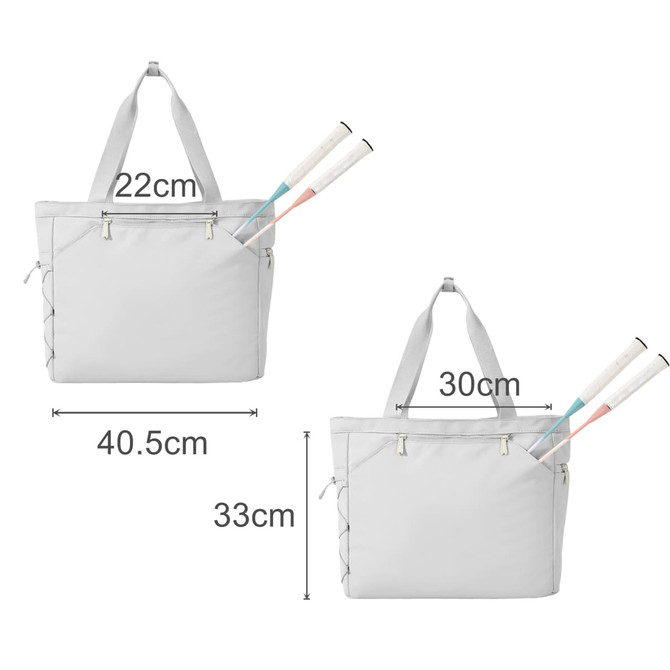 A lightweight grey tennis tote bag displayed with adjustable handles and two tennis racquets partially inserted.