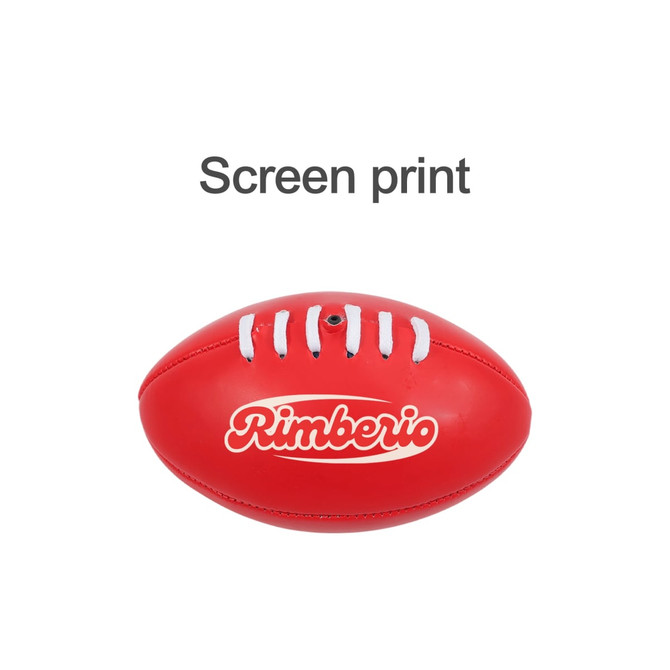 A mini promotional Aussie Rules ball in red, featuring white laces and a logo.