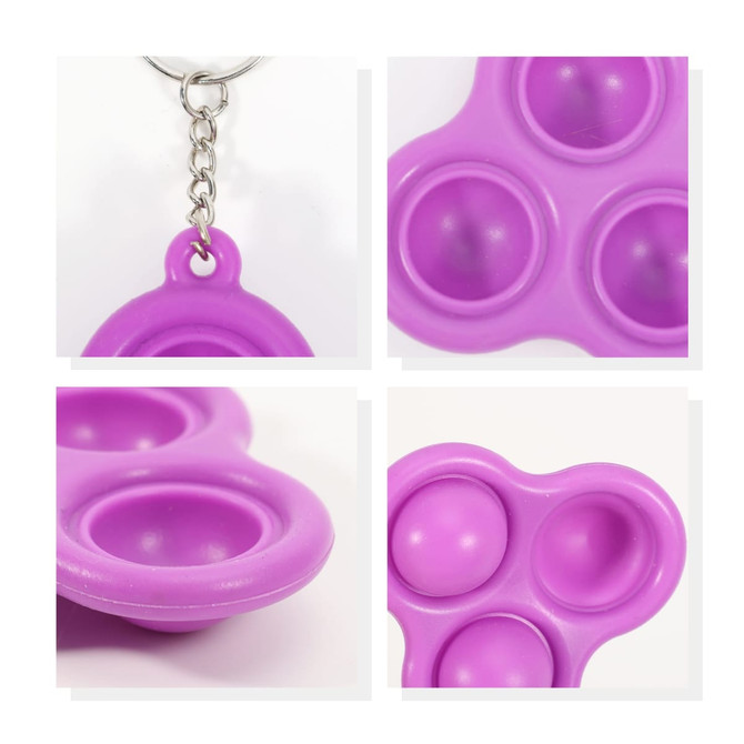 A purple keychain featuring three bubble-like poppers, attached by a silver chain. It has a simple design and a logo.