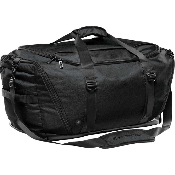 A black duffle bag with sturdy handles and a detachable shoulder strap, featuring a logo.