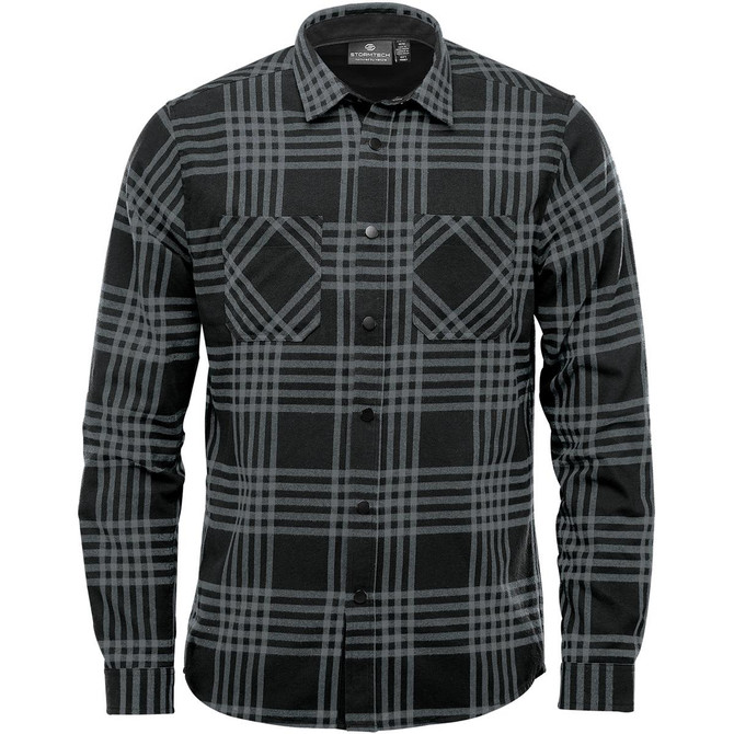 A button-up men's shirt in black and grey plaid, featuring two front pockets and a collar. Includes a logo.