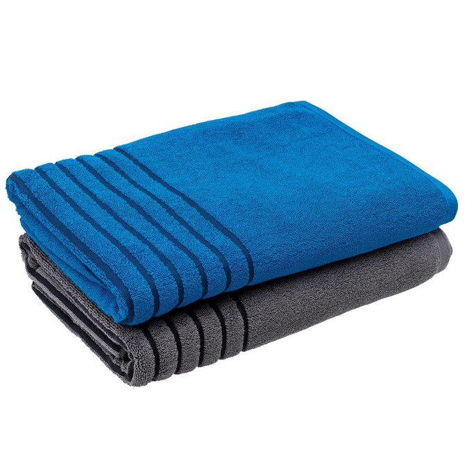 A reversible two-tone towel in blue and grey, stacked with decorative stripes. Features a logo.