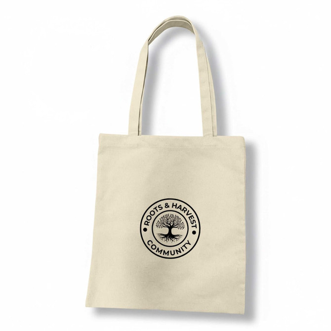 A cream-coloured recycled cotton tote bag with a circular logo featuring a tree design and text.