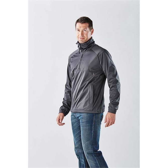 A grey Men's Catskill Anorak jacket is displayed on a model, featuring a high collar and zip front.