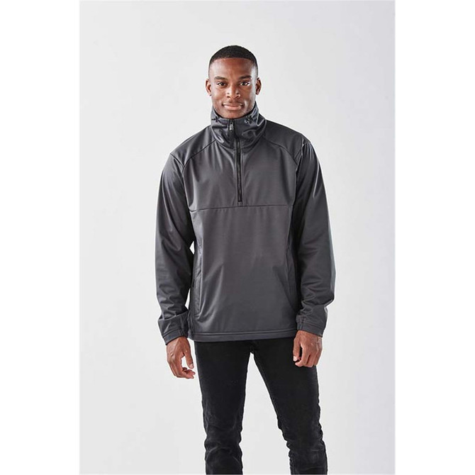 A men's anorak jacket in dark grey, featuring a quarter-zip design and a high collar. It has branding on the chest.