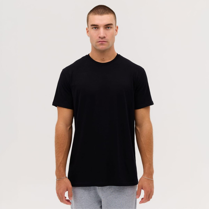 A black t-shirt for men, featuring a classic crew neck and short sleeves, displayed on a model against a neutral background.