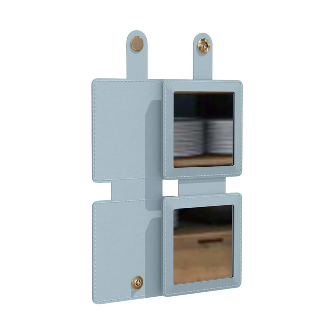 A square folding pocket mirror in light blue with two reflective surfaces and a snap closure.