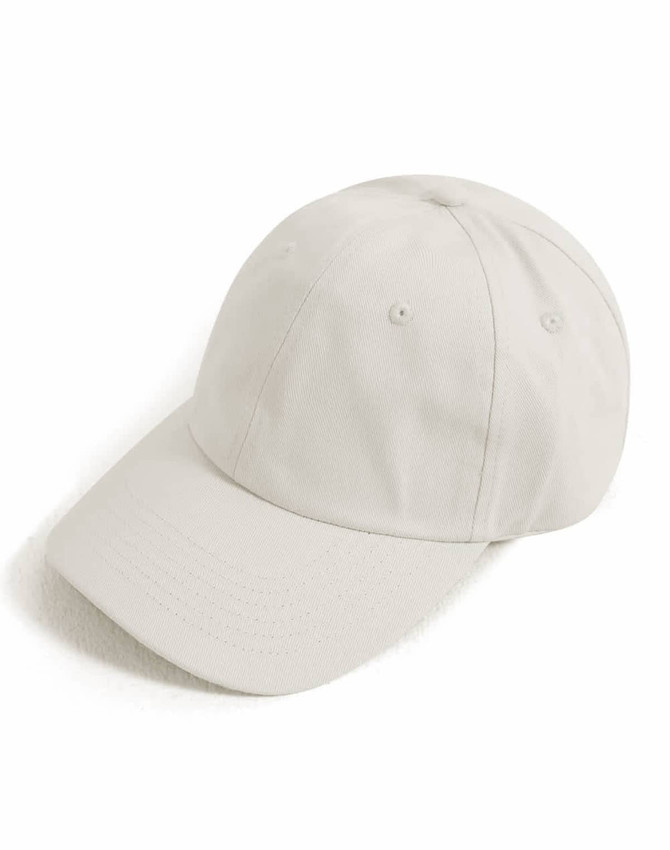 A cotton twill unstructured cap in a light beige colour with a curved brim and a logo.