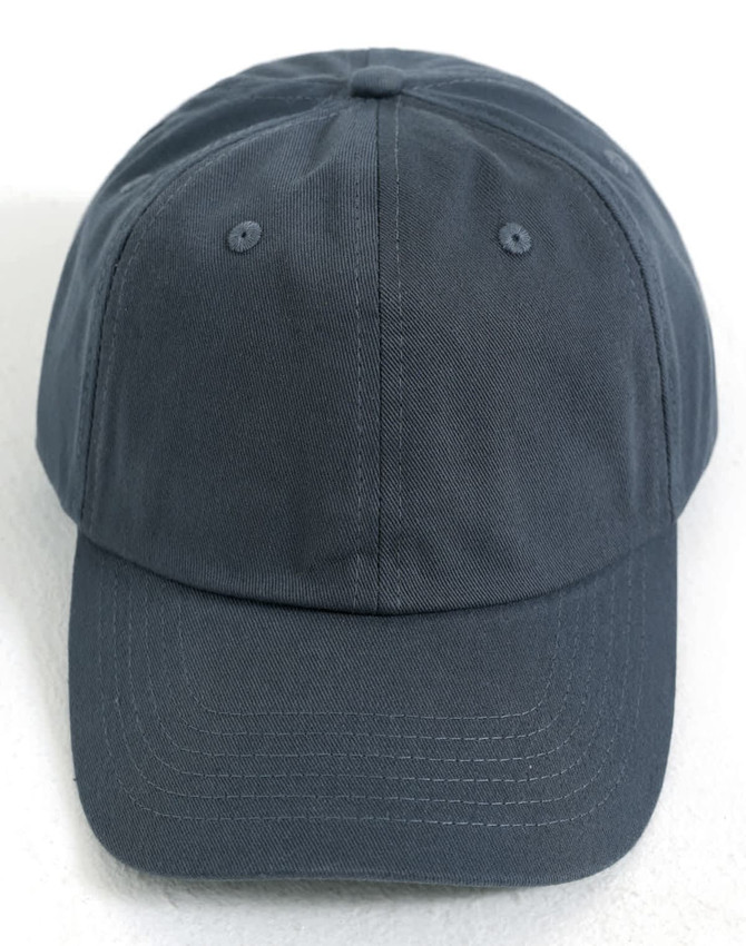 A dark grey cotton twill unstructured cap with ventilation eyelets and a curved brim.